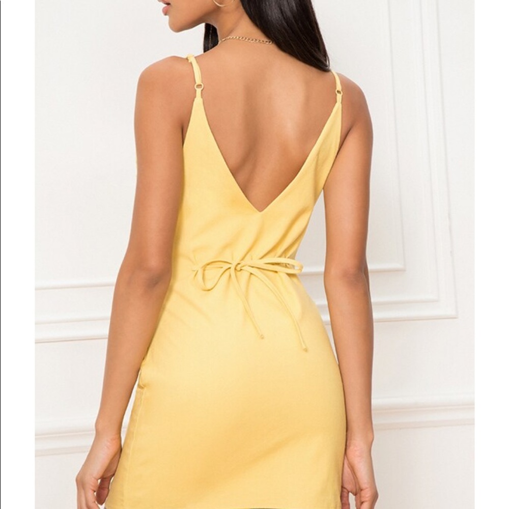 Yellow Super Down dress size medium NEW WITH TAGS!